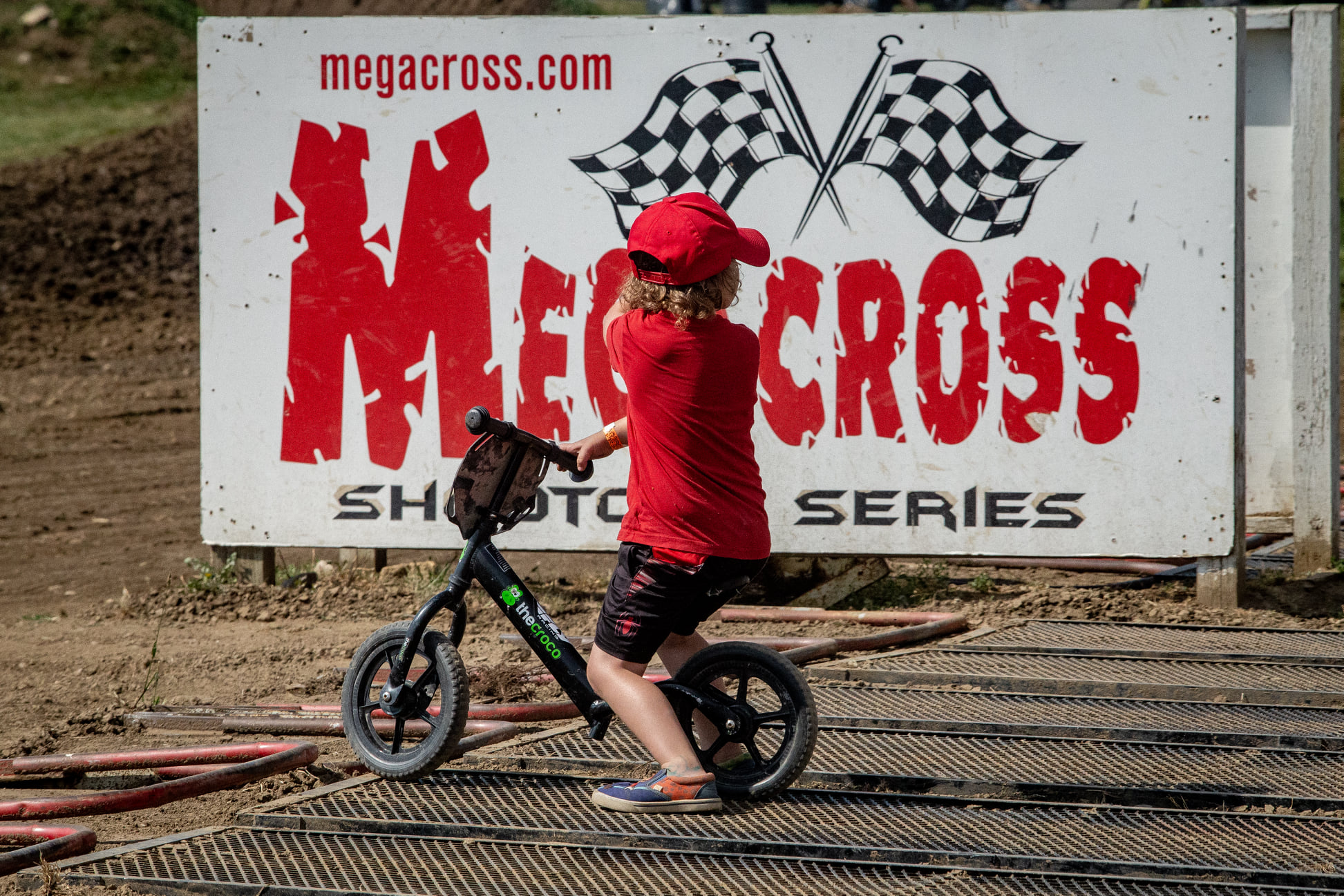 May be an image of one or more people, people playing sports, motorcycle, dirt bike and outdoors