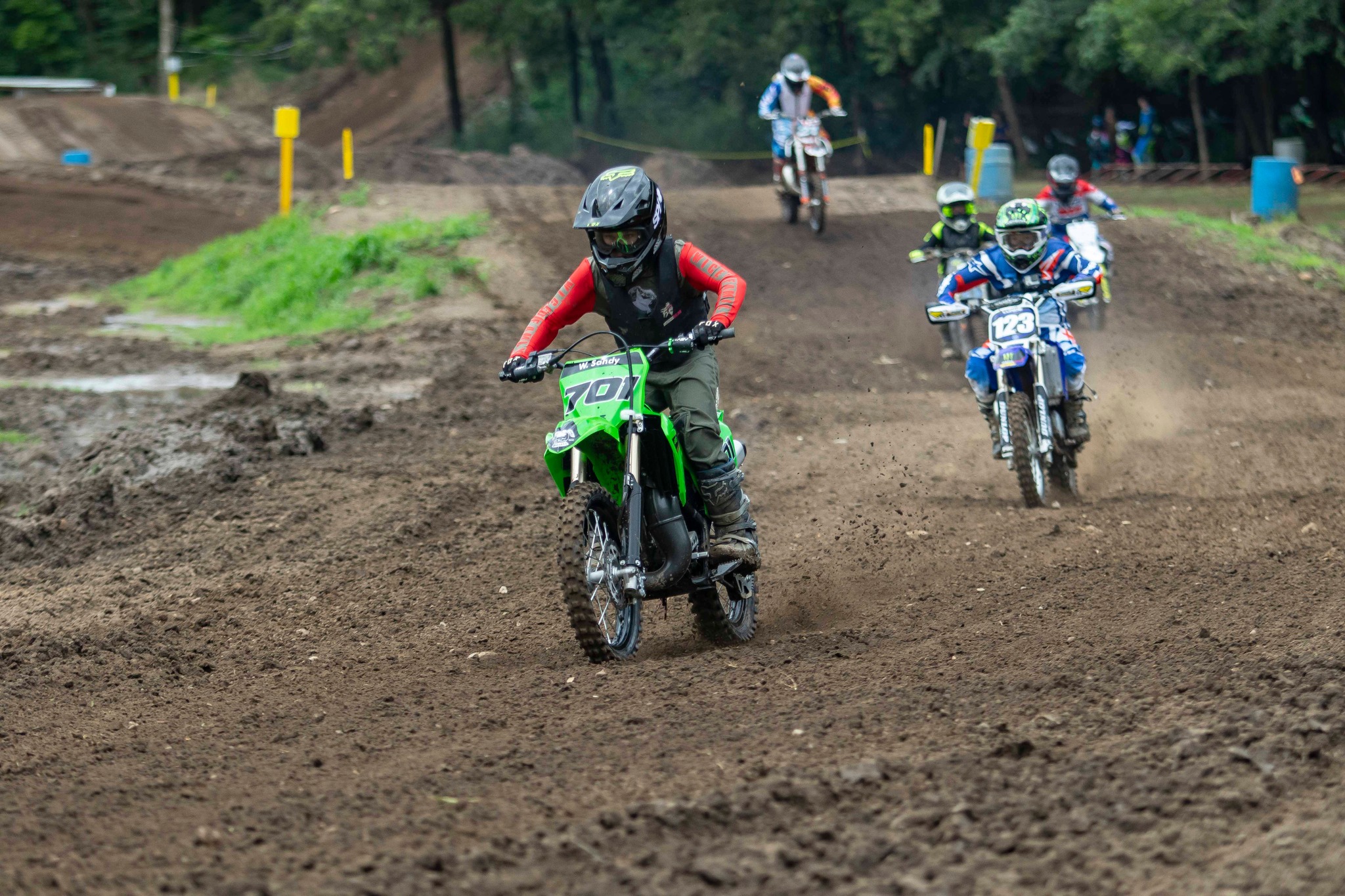 May be an image of 6 people, motorcycle, dirt bike and text