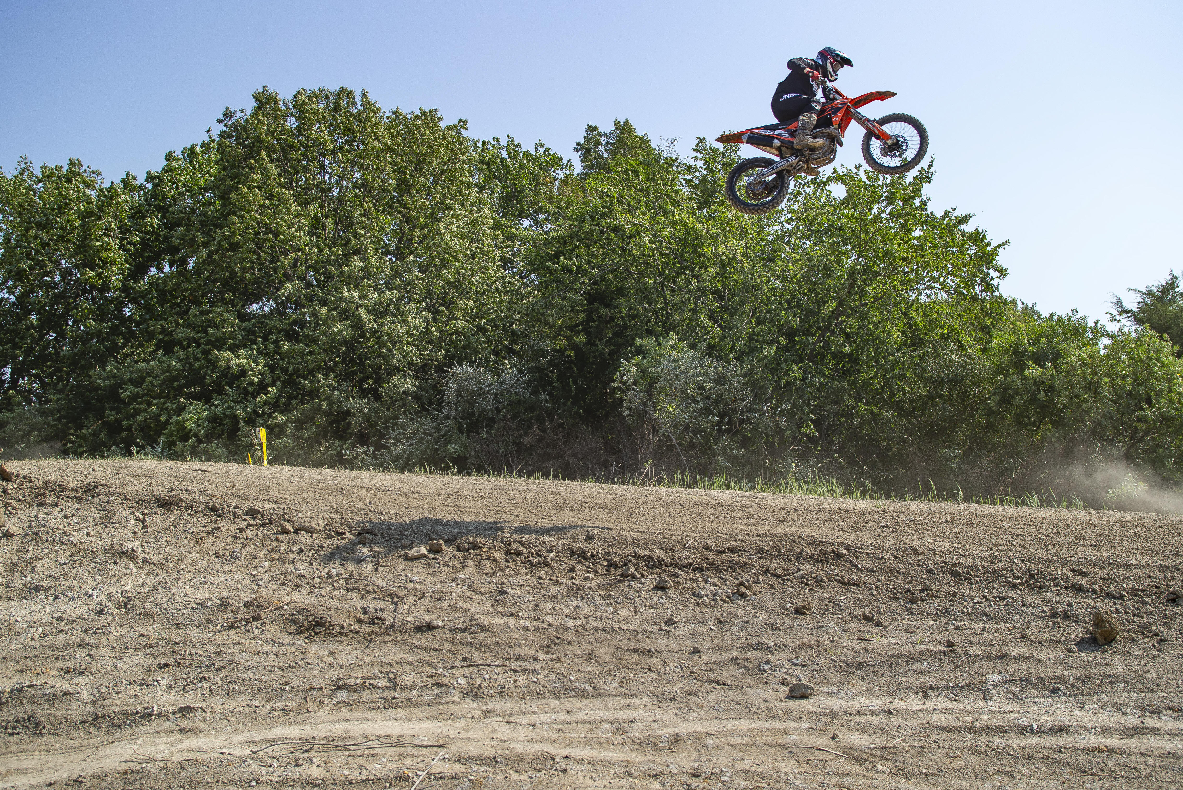 May be an image of 6 people, motorcycle, dirt bike and text