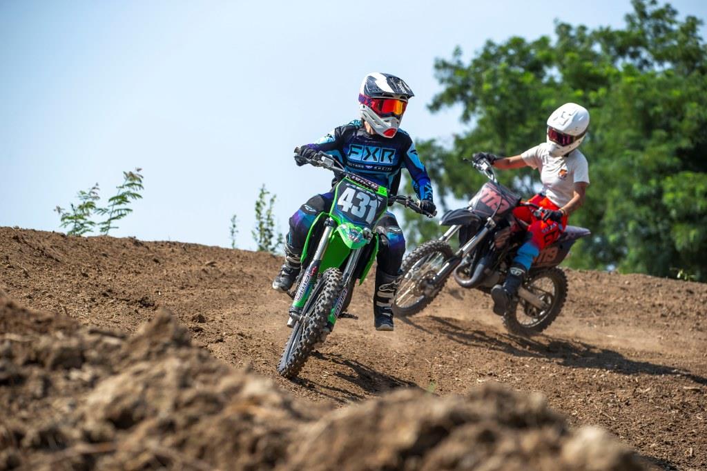 May be an image of 6 people, motorcycle, dirt bike and text